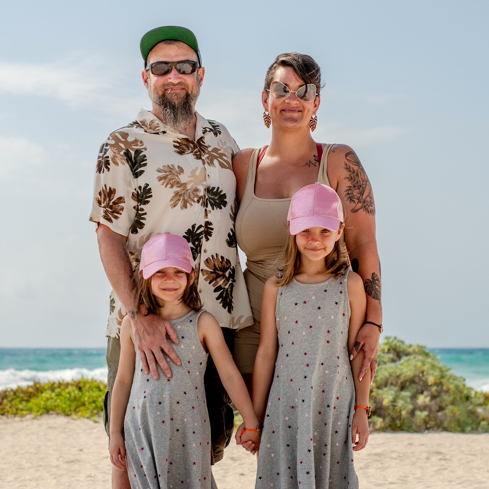 Seth Edwards with his family on a beach